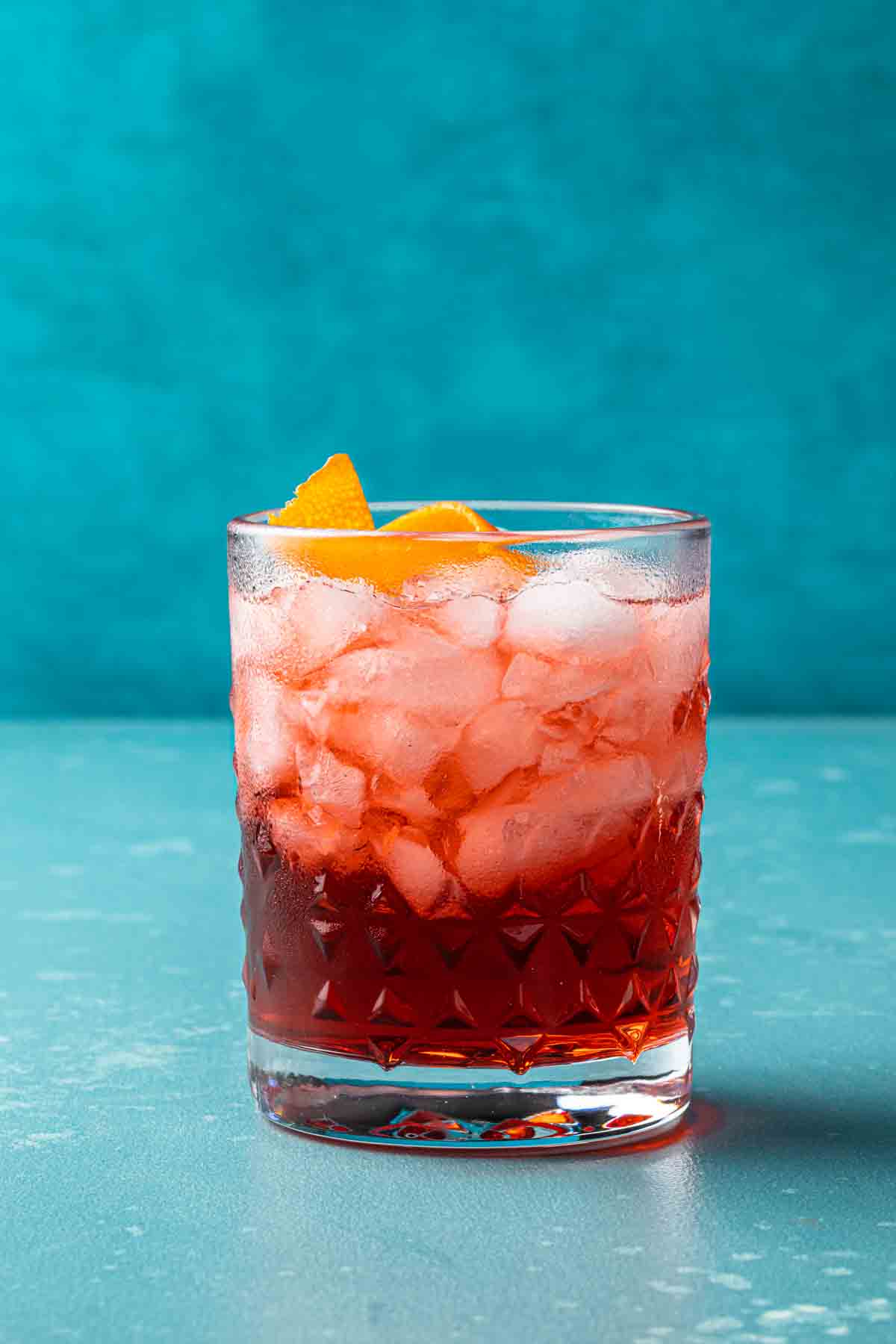 A negroni in a rocks glass with a twist. 