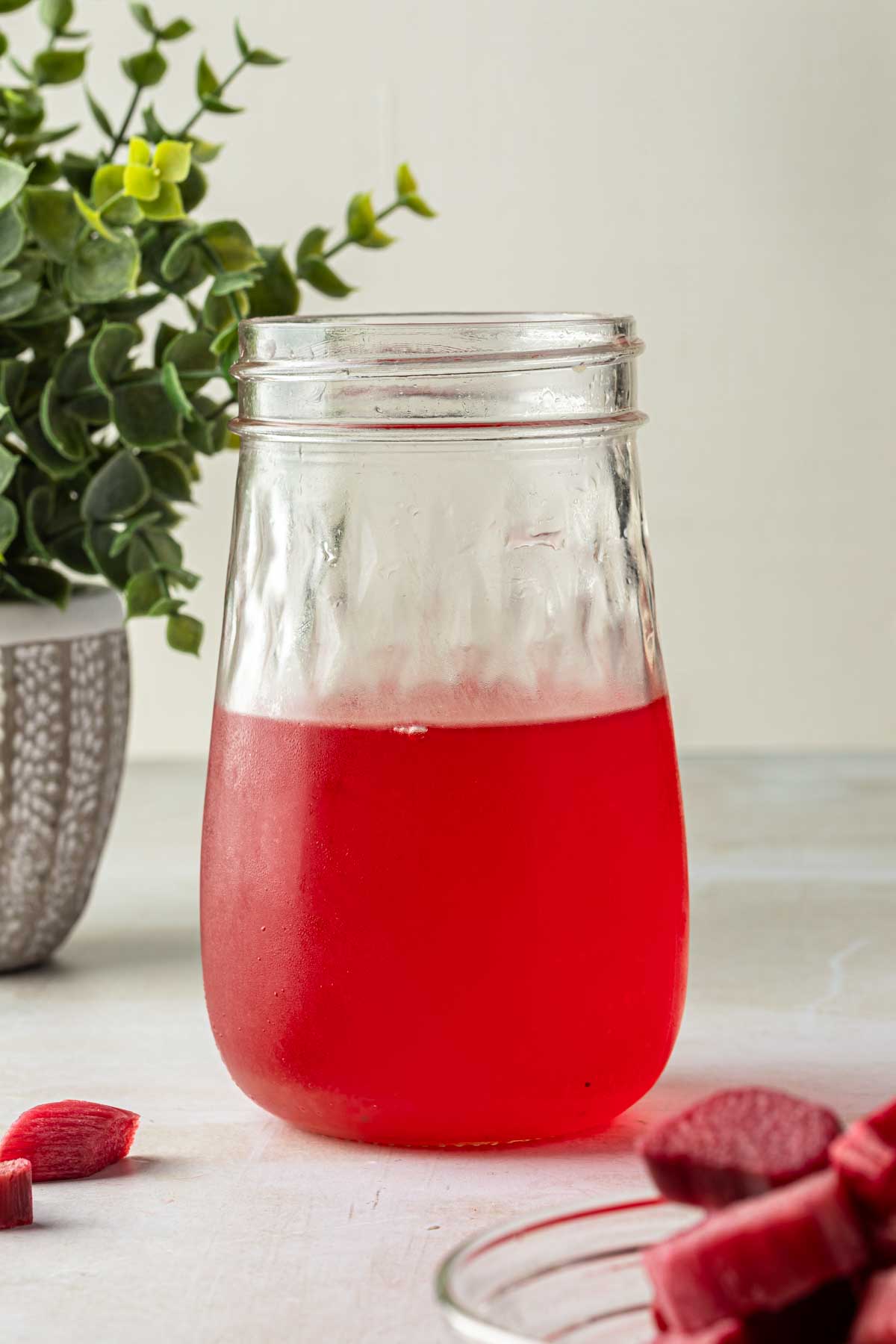 Rhubarb simple syrup in a mason jar. 